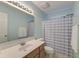 Bathroom with a single vanity, a large mirror with vanity lighting, and a shower at 5105 Parrum Ct, Summerville, SC 29485