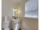 Charming half bath with updated vanity and hardware, paired with a modern sink at 5105 Parrum Ct, Summerville, SC 29485