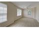Bedroom boasting abundant natural light, carpet floors, and neutral walls at 5105 Parrum Ct, Summerville, SC 29485