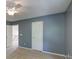 Bedroom showcasing neutral walls, carpet, a ceiling fan, and white trim at 5105 Parrum Ct, Summerville, SC 29485
