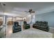 Open-concept living room flowing into the dining area and kitchen, perfect for modern living and entertaining at 5105 Parrum Ct, Summerville, SC 29485