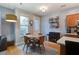 Inviting dining area featuring hardwood floors, lots of natural light, and stainless steel appliances at 5134 E Liberty Park Cir, North Charleston, SC 29405