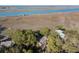 Scenic home nestled among lush greenery, offering privacy and tranquility at 520 E Huron Ave, Folly Beach, SC 29439