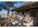 Charming back deck with wood flooring and a view of the expansive marsh, seamlessly blending indoor and outdoor living at 520 E Huron Ave, Folly Beach, SC 29439