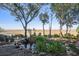Relaxing backyard featuring a pond, a fire pit and an incredible marsh view, perfect for enjoying the outdoors at 520 E Huron Ave, Folly Beach, SC 29439