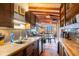 Cozy kitchen featuring wood cabinets and countertops at 520 E Huron Ave, Folly Beach, SC 29439