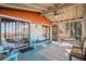 Relaxing screened porch featuring comfortable seating and views of the outdoors at 520 E Huron Ave, Folly Beach, SC 29439