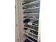 Organized closet featuring shelves filled with various shoes, clothes, and accessories at 542 Amalie Farms Dr, Charleston, SC 29492