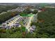 Aerial view of St. Thomas Preserve highlighting its layout, landscaping, and nearby Daniel Island at 542 Amalie Farms Dr, Charleston, SC 29492