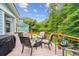 Outdoor deck featuring comfortable seating surrounding a fire pit, perfect for outdoor relaxation at 542 Amalie Farms Dr, Charleston, SC 29492