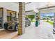 Spacious garage with a car parked inside and an open entrance to the driveway and street at 542 Amalie Farms Dr, Charleston, SC 29492