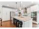 Gourmet kitchen with stainless steel appliances, a backsplash, and pendant lighting at 542 Amalie Farms Dr, Charleston, SC 29492