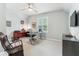 Spacious office featuring a ceiling fan, lots of light, and desk spaces for two at 542 Amalie Farms Dr, Charleston, SC 29492