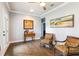 Comfortable sitting room with hardwood floors and lots of natural light at 542 Amalie Farms Dr, Charleston, SC 29492