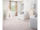 Cozy reading nook features a tent, comfortable chairs, and soft carpeting creating a perfect space for relaxation at 551 Blue Mistflower Dr, Moncks Corner, SC 29461