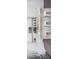 Bright kitchen with white cabinetry, stainless steel appliances, granite countertops, and stylish barstool seating at 551 Blue Mistflower Dr, Moncks Corner, SC 29461