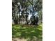 Traditional-style home surrounded by mature trees and lush greenery at 578 Island Walk East, Mount Pleasant, SC 29464