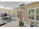 Home gym featuring various workout equipment, natural light, and a ceiling fan at 578 Island Walk East, Mount Pleasant, SC 29464