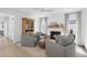 The living room features a fireplace, modern light fixtures and hardwood floors at 578 Island Walk East, Mount Pleasant, SC 29464