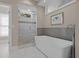 Stunning bathroom featuring a glass enclosed shower and a modern soaking tub at 578 Island Walk East, Mount Pleasant, SC 29464