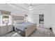 Serene main bedroom with tray ceiling, natural light, and access to the ensuite bathroom at 578 Island Walk East, Mount Pleasant, SC 29464