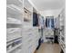 Organized walk-in closet features custom shelving, drawers, and ample space for clothing and accessories at 578 Island Walk East, Mount Pleasant, SC 29464