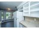 View of the kitchen with white appliances and ample storage space at 610 Old Golf Rd, Summerville, SC 29483