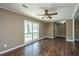 Bright living room with hardwood floors and a large window at 610 Old Golf Rd, Summerville, SC 29483