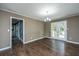 Bright living room with hardwood floors leading to an outdoor patio at 610 Old Golf Rd, Summerville, SC 29483