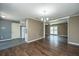 Open-concept living space with hardwood floors and ample natural light at 610 Old Golf Rd, Summerville, SC 29483