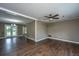 Open living space featuring hardwood floors and a view to the outside at 610 Old Golf Rd, Summerville, SC 29483