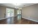 Open floor plan with hardwood floors and access to the backyard at 610 Old Golf Rd, Summerville, SC 29483