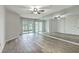 Primary bedroom featuring lots of space, access to a deck, and a mirrored wall at 638 Harbor Creek Pl # 19, Charleston, SC 29412