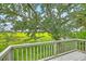 Enjoy a relaxing view from this spacious deck overlooking a lush, green landscape at 638 Harbor Creek Pl # 19, Charleston, SC 29412