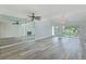 Open-concept living area boasts a wall mirror and views of the outdoor scenery at 638 Harbor Creek Pl # 19, Charleston, SC 29412