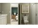 Modern bathroom featuring a vanity with a white countertop and a shower with glass doors at 639 Culpepper St, Summerville, SC 29486