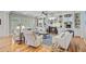 Bright living room features hardwood floors, fireplace with built-ins, and comfortable seating at 750 Navigators Run, Mount Pleasant, SC 29464