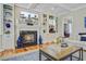 Cozy living room features a fireplace with built-in shelving and modern decor at 750 Navigators Run, Mount Pleasant, SC 29464