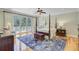 Tranquil main bedroom features a four-poster bed, private balcony access, and a bright, airy ambiance at 750 Navigators Run, Mount Pleasant, SC 29464