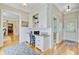 Bright area features a built-in desk, cabinets, shelving, and a view to the home's entry at 750 Navigators Run, Mount Pleasant, SC 29464
