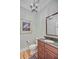 Powder room featuring a granite countertop, and elegant lighting at 750 Navigators Run, Mount Pleasant, SC 29464