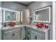 Bathroom showcasing a double vanity with striking red glass sinks at 762 Swanson Ave Ave, Charleston, SC 29412