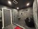 Sleek bathroom showcases a walk-in shower with stone tile and a modern black soaking tub at 762 Swanson Ave Ave, Charleston, SC 29412