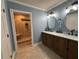 Bathroom with double sink vanity, tile floor, and tiled shower at 762 Swanson Ave Ave, Charleston, SC 29412