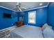 Bright bedroom with a ceiling fan, a TV, and an area rug at 762 Swanson Ave Ave, Charleston, SC 29412