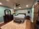 The bedroom has a large rug and a dresser with a mirror at 762 Swanson Ave Ave, Charleston, SC 29412