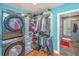 Walk-in closet with laundry machines in the entrance to the closet at 762 Swanson Ave Ave, Charleston, SC 29412