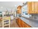 Gourmet kitchen featuring stone countertops, stainless steel appliances, and custom tile backsplash at 762 Swanson Ave Ave, Charleston, SC 29412