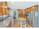 Well-appointed kitchen featuring custom cabinets and stainless steel appliances, with a butcher block island at 762 Swanson Ave Ave, Charleston, SC 29412