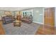 Inviting living room showcasing a comfortable seating arrangement and a charming front entrance at 762 Swanson Ave Ave, Charleston, SC 29412